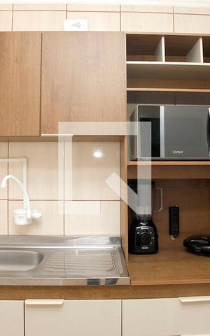 Studio à venda com 32m², 1 quarto e sem vagaCozinha + Área de Serviço