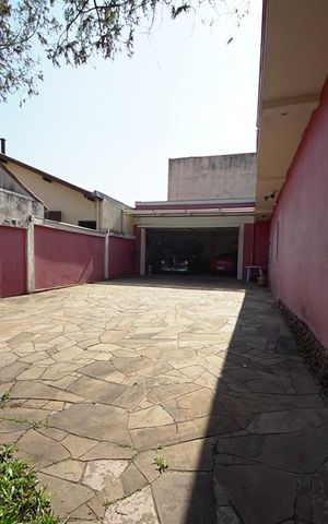 Casa à venda com 450m², 5 quartos e 4 vagasGaragem
