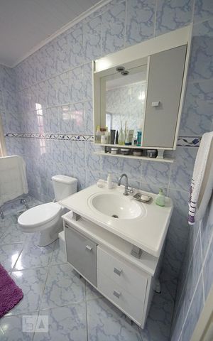 Casa à venda com 450m², 5 quartos e 4 vagasBanheiro da Suíte