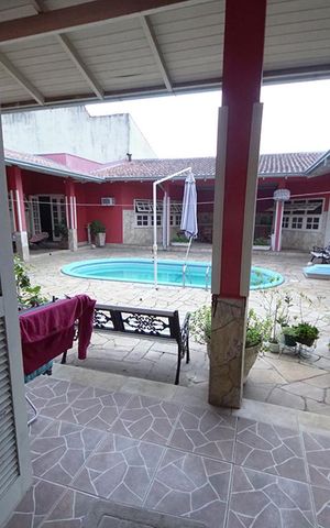 Casa à venda com 450m², 5 quartos e 4 vagasQuarto 3 Suíte