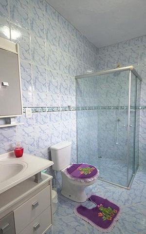 Casa à venda com 450m², 5 quartos e 4 vagasBanheiro 2