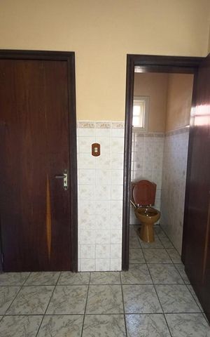 Casa à venda com 450m², 5 quartos e 4 vagasBanheiro 3