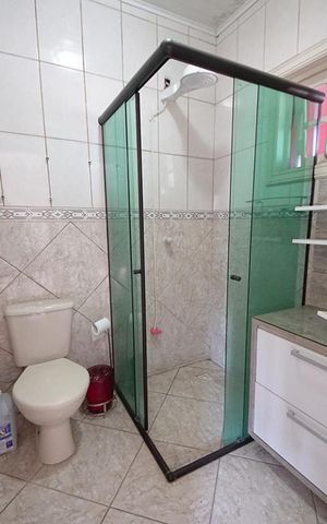 Casa à venda com 450m², 5 quartos e 4 vagasBanheiro 4
