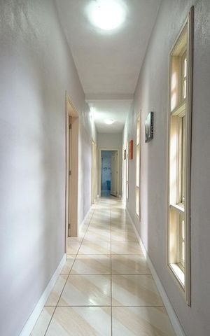 Casa à venda com 450m², 5 quartos e 4 vagasCorredor