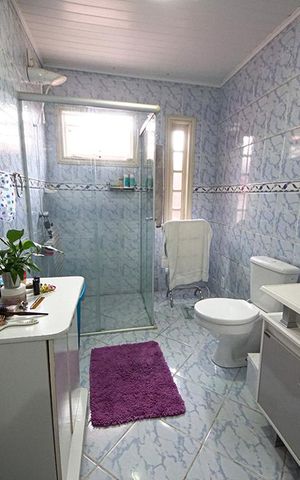 Casa à venda com 450m², 5 quartos e 4 vagasBanheiro da Suíte