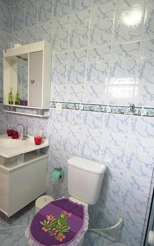 Casa à venda com 450m², 5 quartos e 4 vagasBanheiro 2
