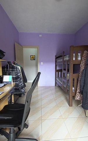 Casa à venda com 450m², 5 quartos e 4 vagasQuarto 2