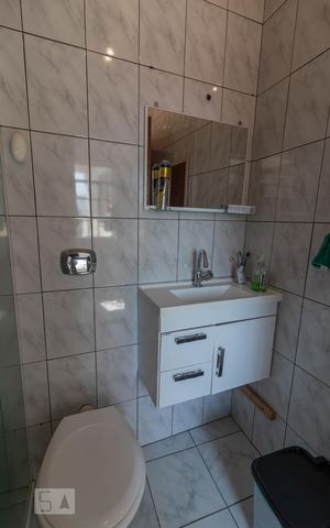 Casa à venda com 250m², 4 quartos e 2 vagas Casa à venda com 250m², 4 quartos e 2 vagasBanheiro