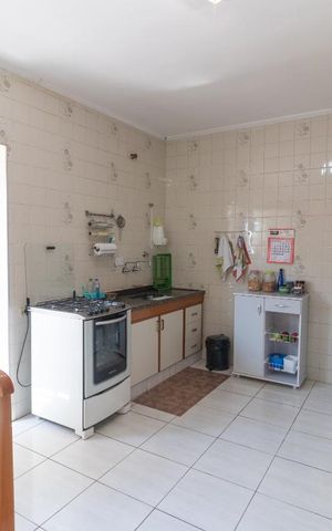 Casa à venda com 250m², 4 quartos e 2 vagas Casa à venda com 250m², 4 quartos e 2 vagasCozinha