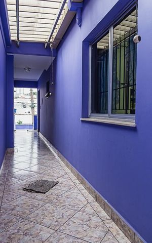 Casa à venda com 470m², 4 quartos e 6 vagas Casa à venda com 470m², 4 quartos e 6 vagasCorredor lateral