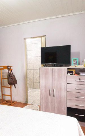 Casa à venda com 150m², 4 quartos e 2 vagas Casa à venda com 150m², 4 quartos e 2 vagasQuarto 1