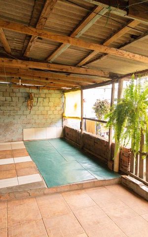 Casa à venda com 150m², 4 quartos e 2 vagas Casa à venda com 150m², 4 quartos e 2 vagasVaranda