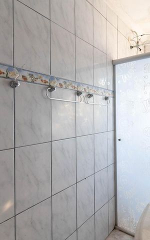 Casa à venda com 293m², 3 quartos e 1 vagaBanheiro da Suíte 2