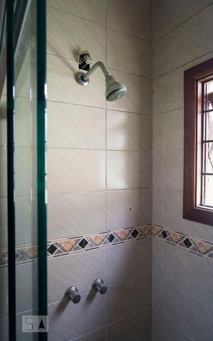 Casa à venda com 220m², 3 quartos e 3 vagasBanheiro da Suíte 1