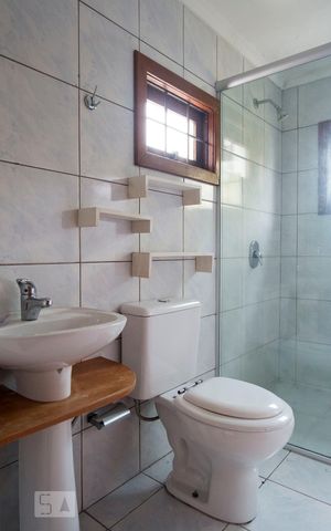 Casa à venda com 220m², 3 quartos e 3 vagasBanheiro da Suíte 2