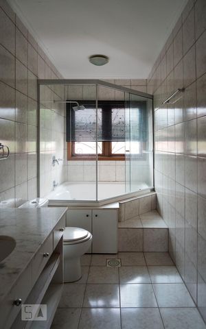 Casa à venda com 220m², 3 quartos e 3 vagasBanheiro da Suíte 3