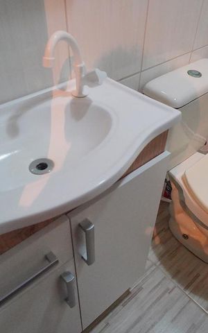 Casa de condomínio à venda com 82m², 2 quartos e 1 vagaBanheiro