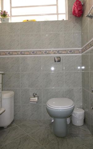 Casa à venda com 172m², 3 quartos e 2 vagasBanheiro da Suite