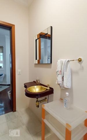 Casa de condomínio à venda com 322m², 4 quartos e 4 vagas Casa de condomínio à venda com 322m², 4 quartos e 4 vagasLavabo