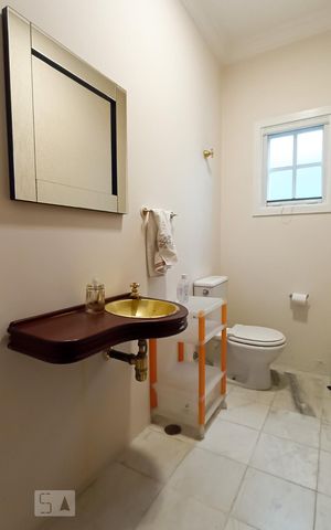 Casa de condomínio à venda com 322m², 4 quartos e 4 vagas Casa de condomínio à venda com 322m², 4 quartos e 4 vagasLavabo