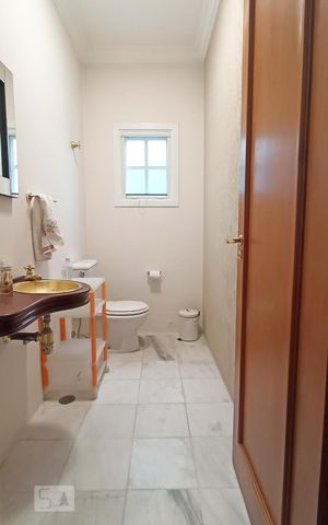 Casa de condomínio à venda com 322m², 4 quartos e 4 vagas Casa de condomínio à venda com 322m², 4 quartos e 4 vagasLavabo