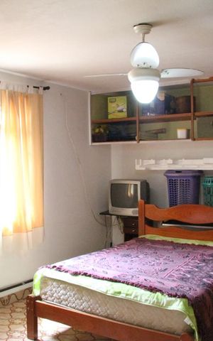 Casa à venda com 150m², 5 quartos e 3 vagasQuarto Fundos
