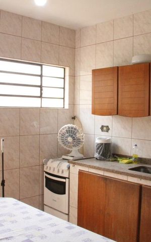 Casa à venda com 150m², 5 quartos e 3 vagasCozinha Fundos