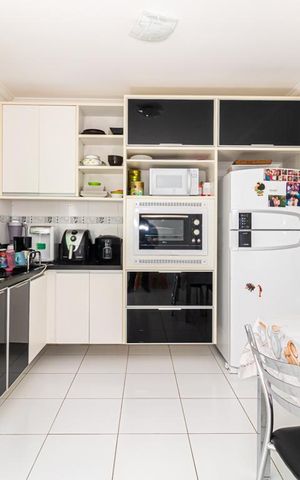 Casa de condomínio para alugar com 110m², 3 quartos e 2 vagasCozinha