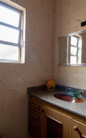 Casa à venda com 230m², 4 quartos e 4 vagasBanheiro Social