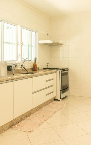Casa à venda com 128m², 3 quartos e 3 vagas Casa à venda com 128m², 3 quartos e 3 vagasCozinha