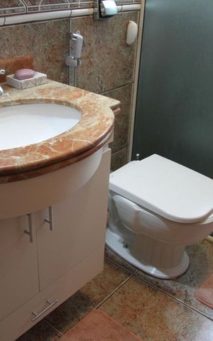 Casa à venda com 208m², 4 quartos e 3 vagasBanheiro Suite