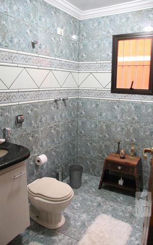Casa à venda com 208m², 4 quartos e 3 vagasBanheiro