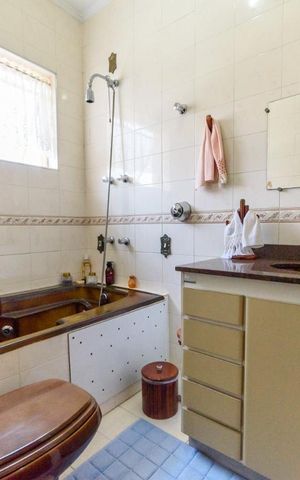 Casa à venda com 198m², 3 quartos e 2 vagas Casa à venda com 198m², 3 quartos e 2 vagasBanheiro da Suíte