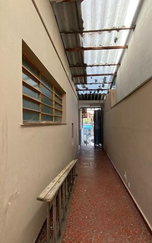 Casa à venda com 129m², 2 quartos e 2 vagas Casa à venda com 129m², 2 quartos e 2 vagasCorredor