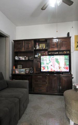 Casa à venda com 140m², 2 quartos e 2 vagasSala de tv
