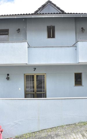 Casa de condomínio à venda com 255m², 4 quartos e 1 vagaFachada da Casa