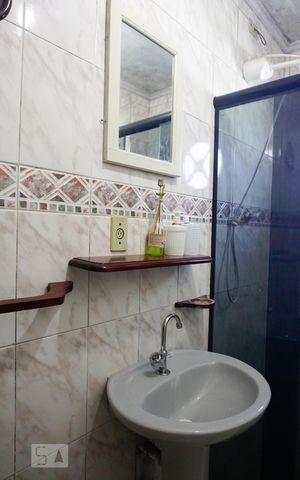 Casa à venda com 220m², 4 quartos e 2 vagas Casa à venda com 220m², 4 quartos e 2 vagasBanheiro da Suíte 1