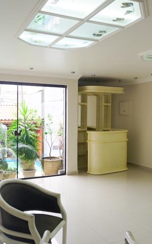 Casa à venda com 300m², 5 quartos e 4 vagasCasa 1 - Sala