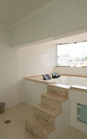 Casa à venda com 285m², 3 quartos e 3 vagas Casa à venda com 285m², 3 quartos e 3 vagasBanheiro da Suíte