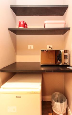 Studio à venda com 33m², 1 quarto e 1 vaga Studio à venda com 33m², 1 quarto e 1 vagaCozinha