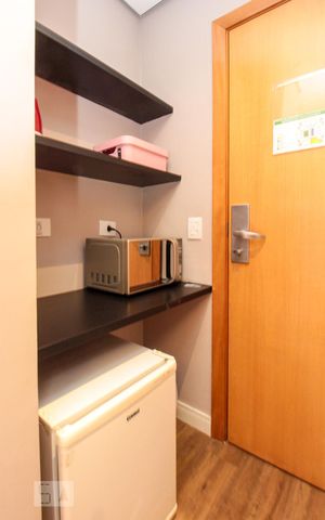 Studio à venda com 33m², 1 quarto e 1 vaga Studio à venda com 33m², 1 quarto e 1 vagaCozinha