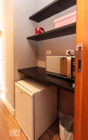 Studio à venda com 33m², 1 quarto e 1 vaga Studio à venda com 33m², 1 quarto e 1 vagaCozinha