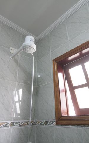 Casa à venda com 169m², 3 quartos e 3 vagasChuveiro