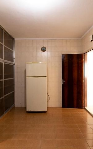 Casa à venda com 190m², 4 quartos e 2 vagas Casa à venda com 190m², 4 quartos e 2 vagasCozinha