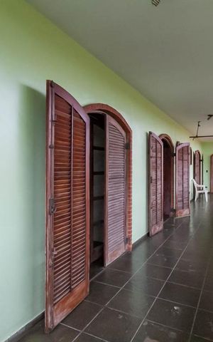 Casa à venda com 570m², 4 quartos e 4 vagas Casa à venda com 570m², 4 quartos e 4 vagasVaranda dass Suítes