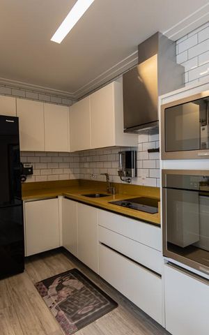 Studio para alugar com 55m², 1 quarto e 2 vagas Studio para alugar com 55m², 1 quarto e 2 vagasCozinha