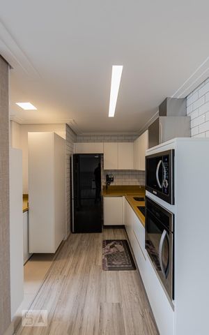 Studio para alugar com 55m², 1 quarto e 2 vagas Studio para alugar com 55m², 1 quarto e 2 vagasCozinha