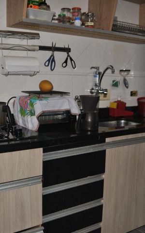 Casa de condomínio para alugar com 60m², 2 quartos e 2 vagasCozinha