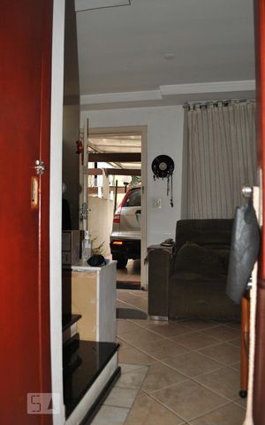 Casa de condomínio para alugar com 60m², 2 quartos e 2 vagasSala - corredor
