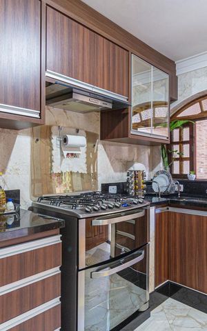 Casa à venda com 125m², 3 quartos e 3 vagas Casa à venda com 125m², 3 quartos e 3 vagasCozinha